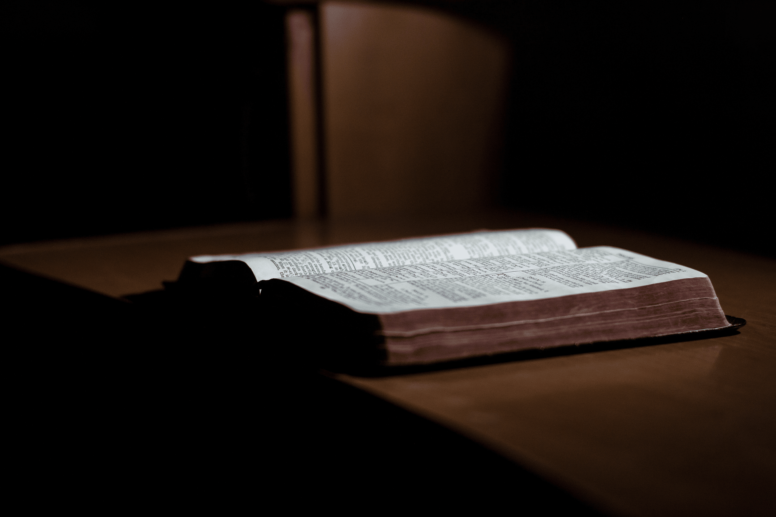 an open bible on the table