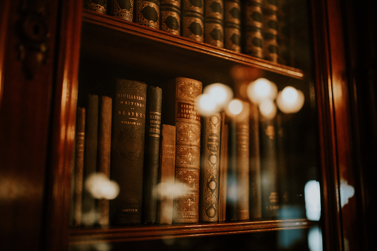 books behind glass on a shelf