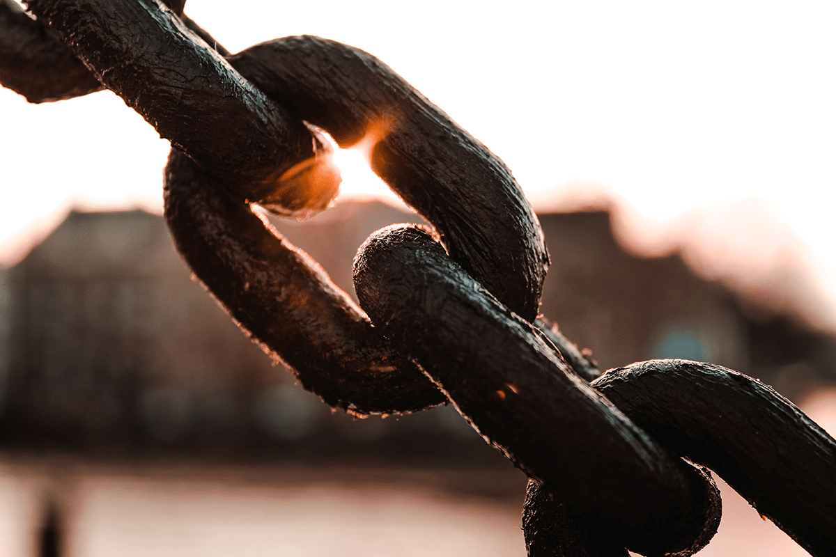 chain in front of sunset