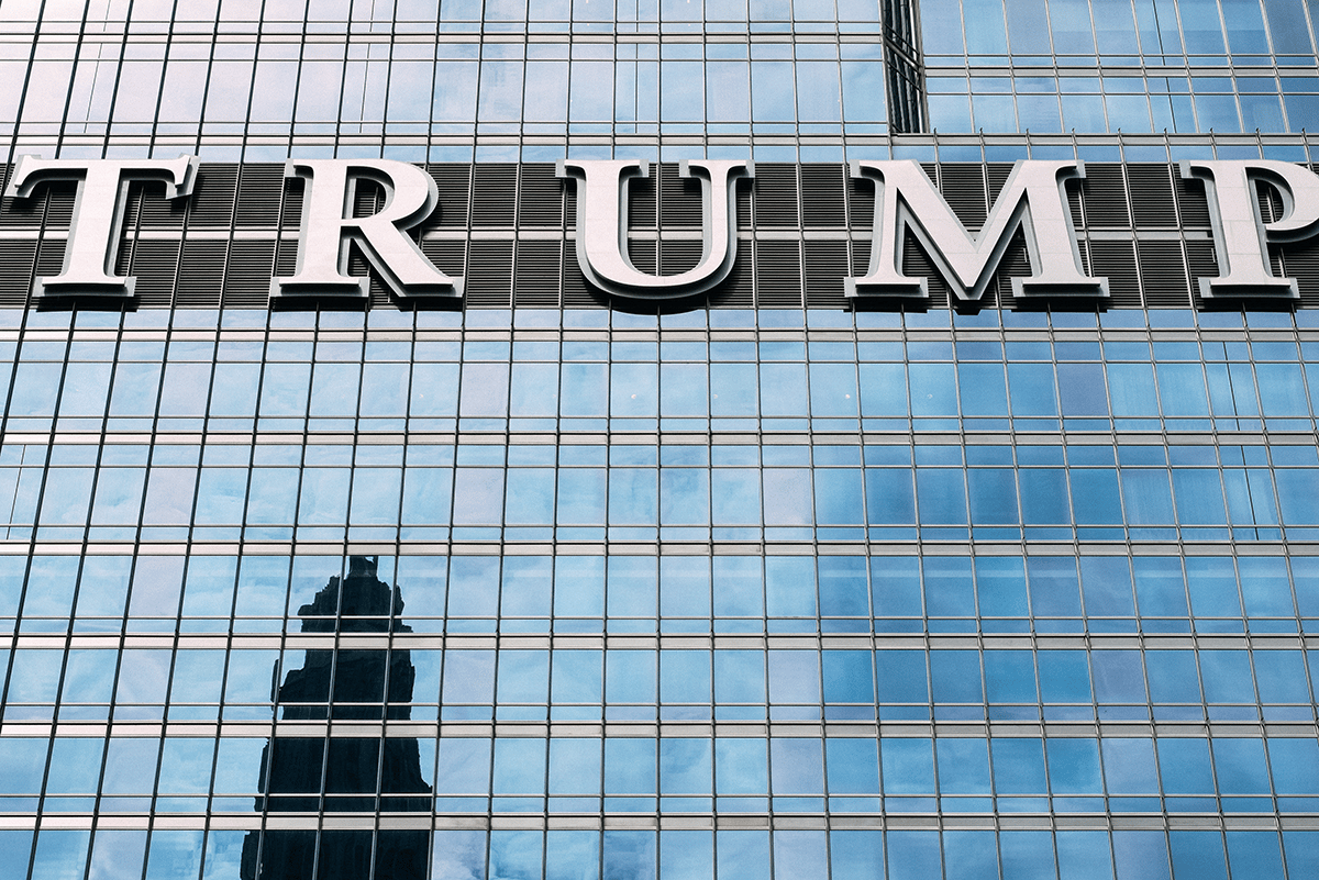 glass building with the name trump displayed
