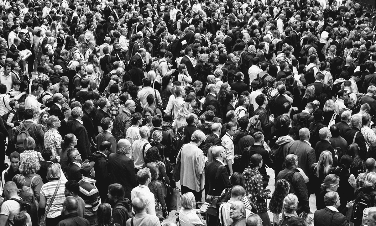 large crowd in black and white