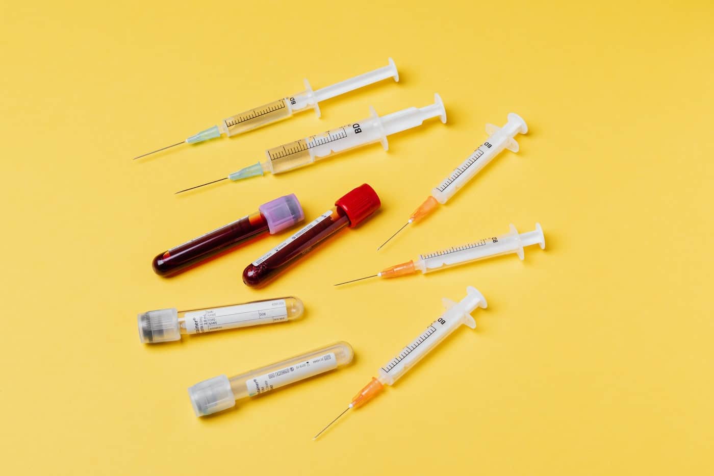 blood donation vials and hypodermic needles